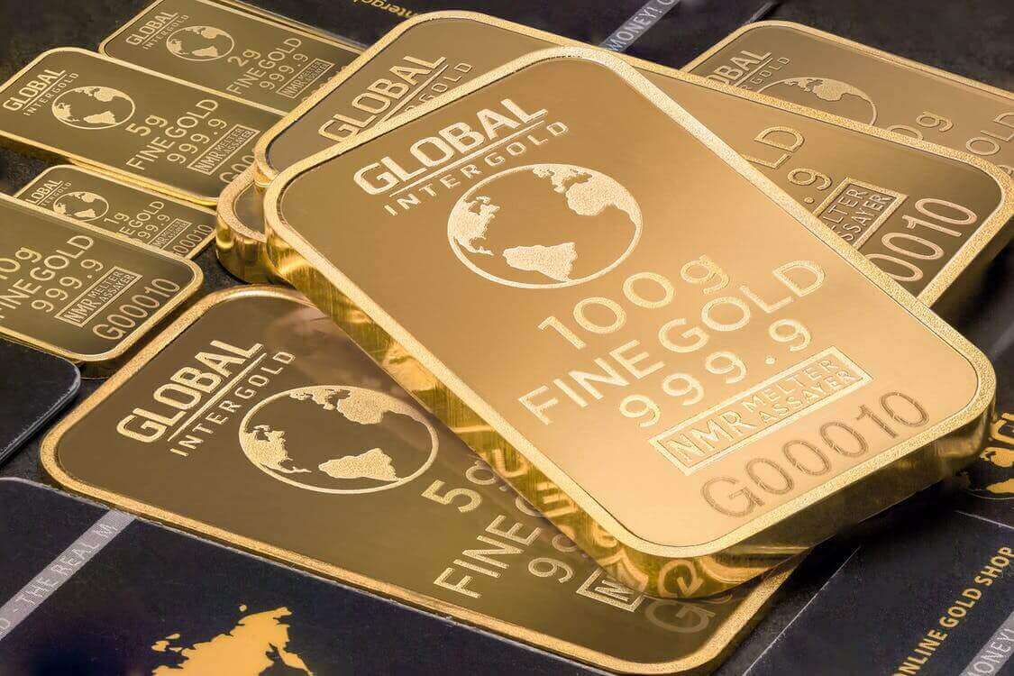 several gold bars stacked up